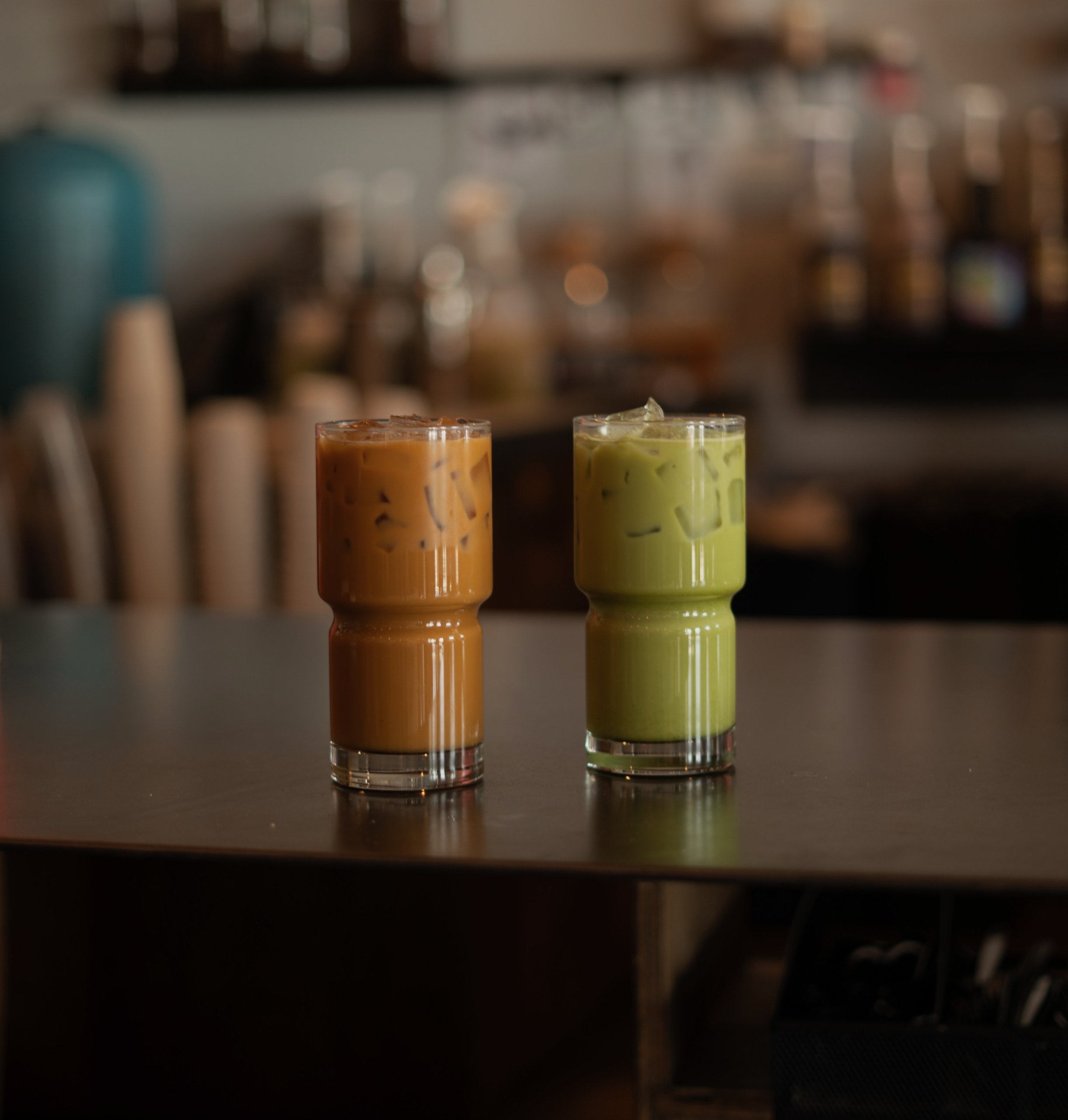 2 cold specialty drinks at Cartel Coffee