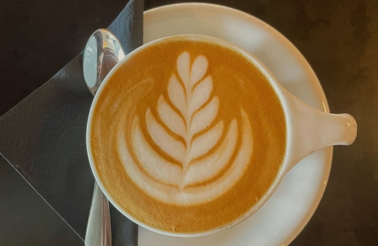 Cappuccino milk art at Cartel Coffee Roasters