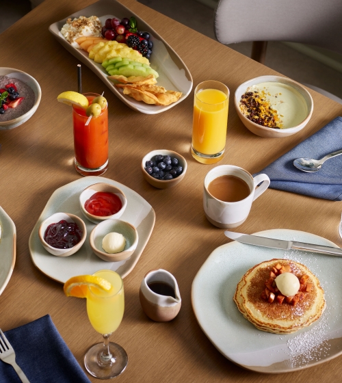 An assortment of breakfast food on a table at Yellowbell
