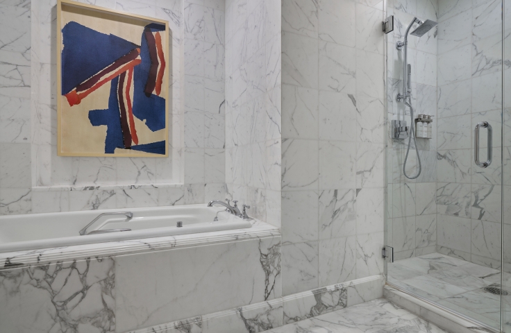 The Shower and tub inside a Presidential Suite at the Camby