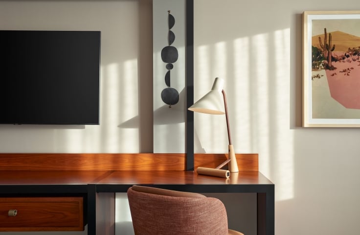 A desk in a room at The Camby