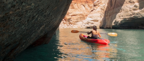 A woma paddle boarding in Phoenix