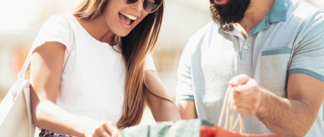 A couple showing each other what they bought from Scottsdale Fashion Square in Phoenix