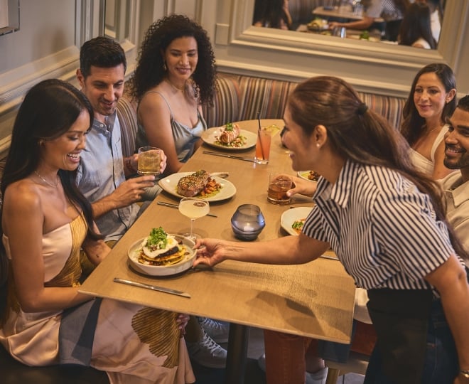 A group of people dining at Yellowbell in The Camby