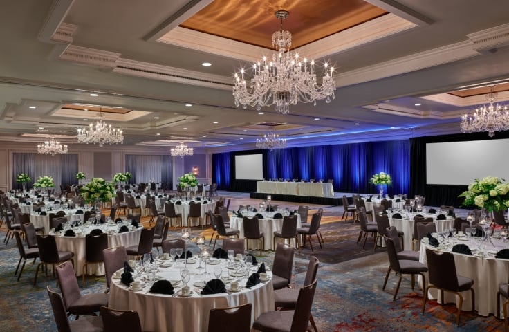 Camby ballroom with tables setup for a function
