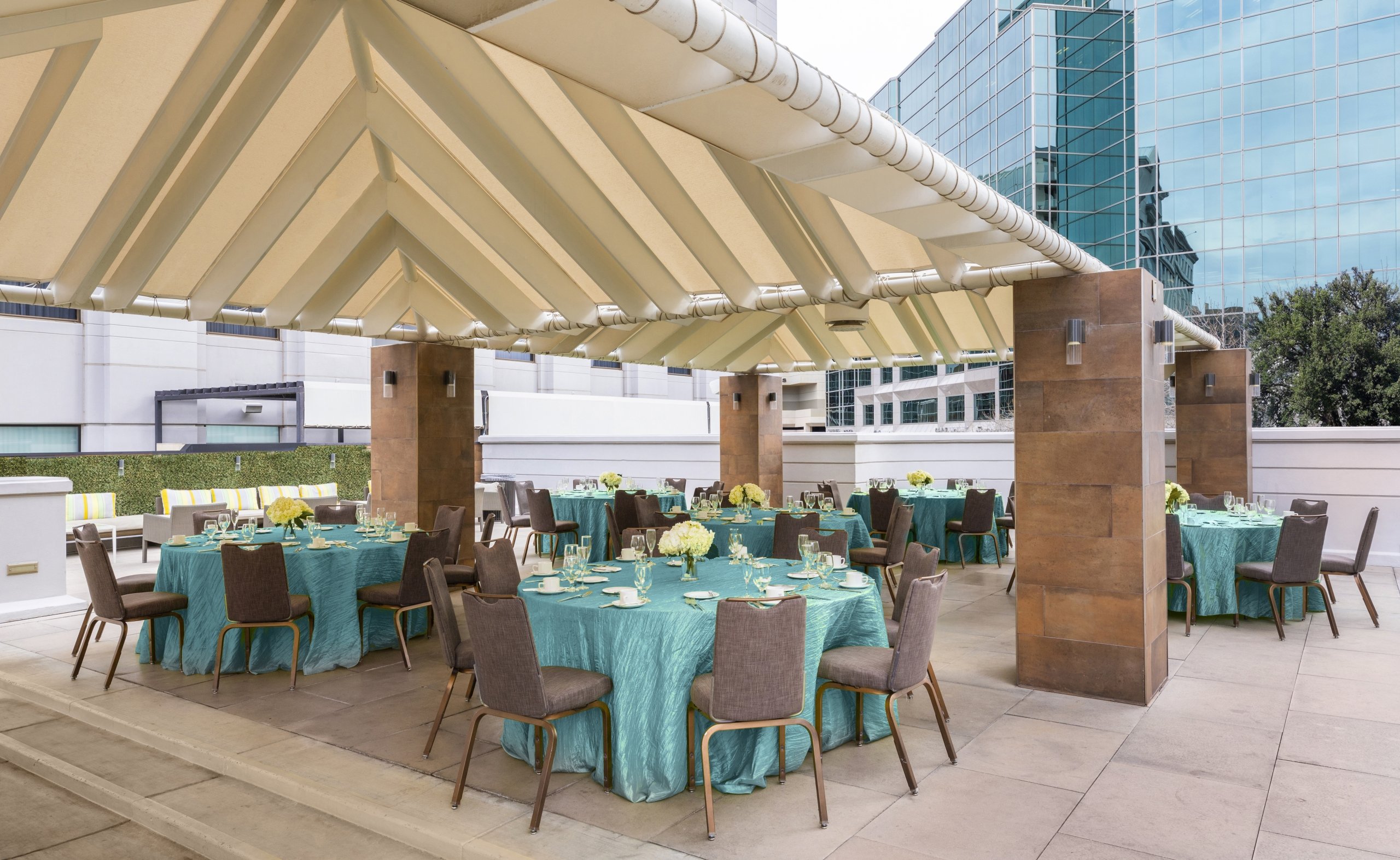 Tables setup at the Pool deck venue at the Camby