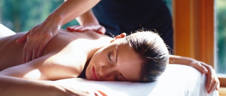 A woman getting a back massage at Tierra Luna Spa