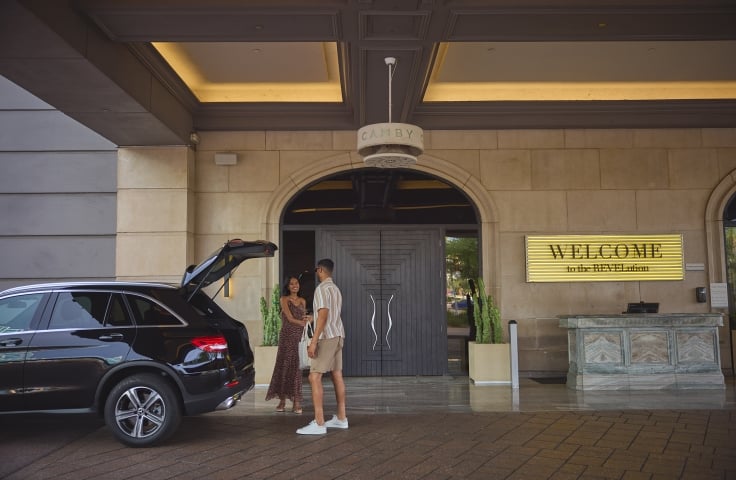 Valet, Front Drive, Black Car, Man & Woman