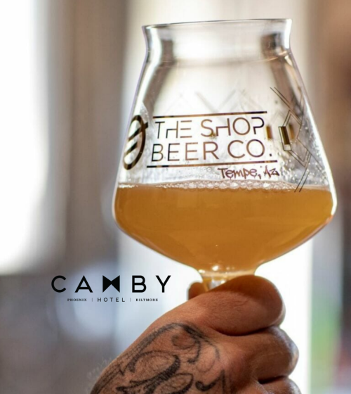 The Shop Beer Co. Beer glass, hand.