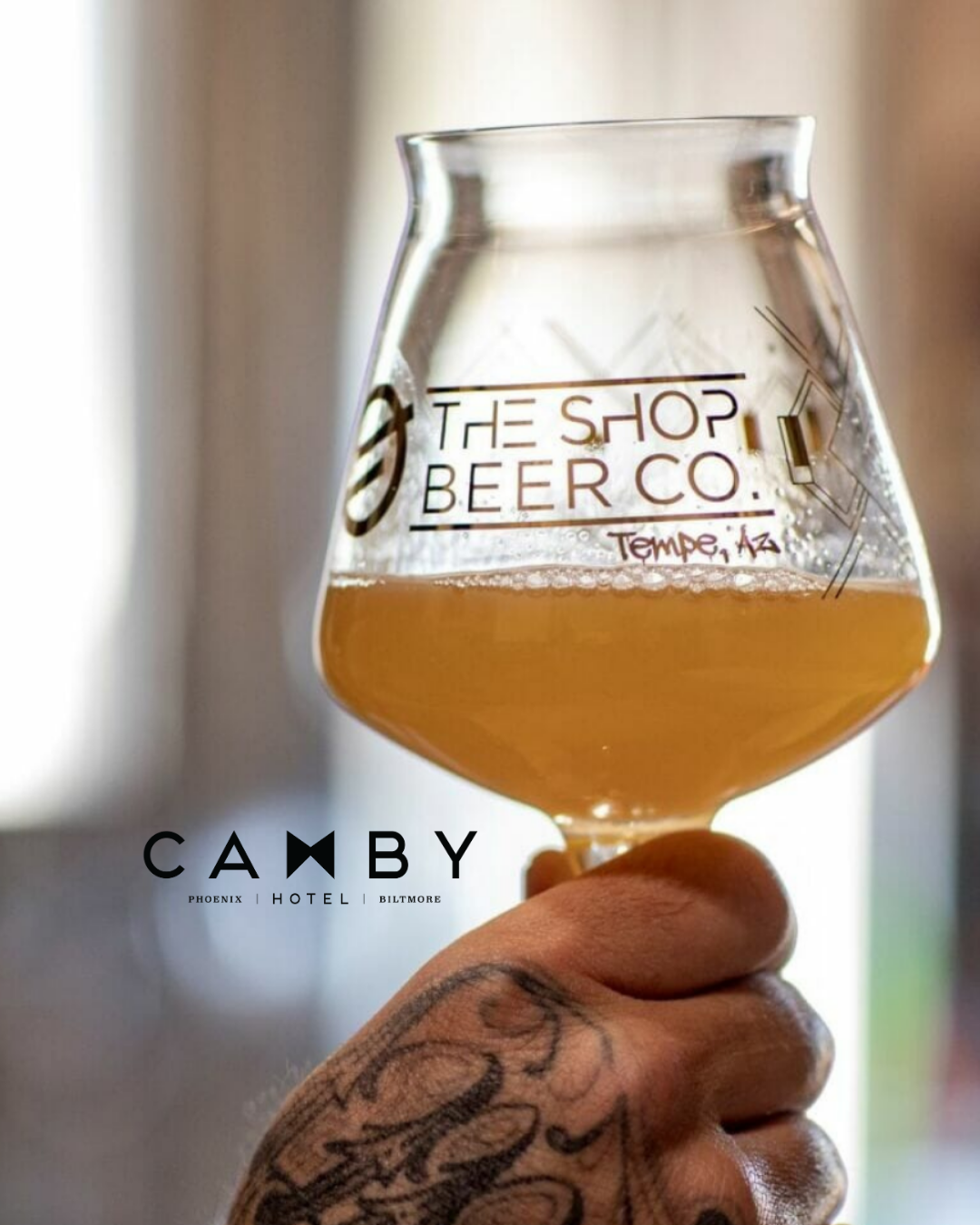 The Shop Beer Co. Beer glass, hand.