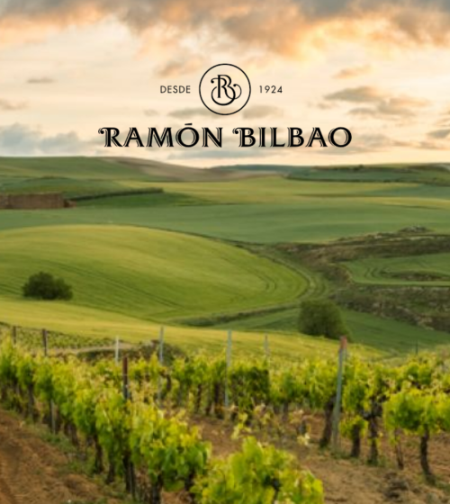 vineyard backdrop with logo of Ramon Bilbao