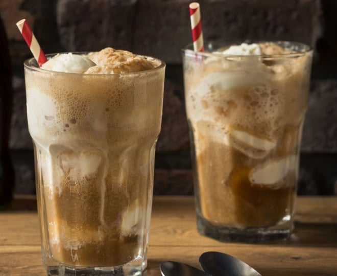 Two root beer floats on a table